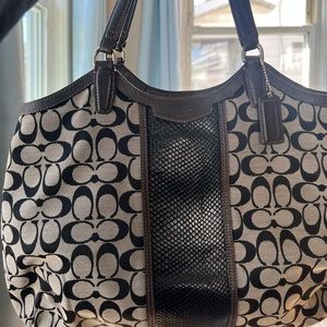 Coach pocketbook practically brand new.